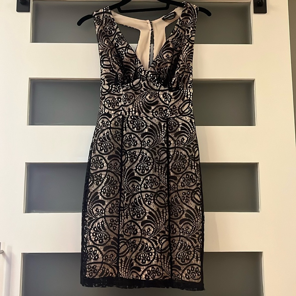 Black and Nude bebe dress. Size 2